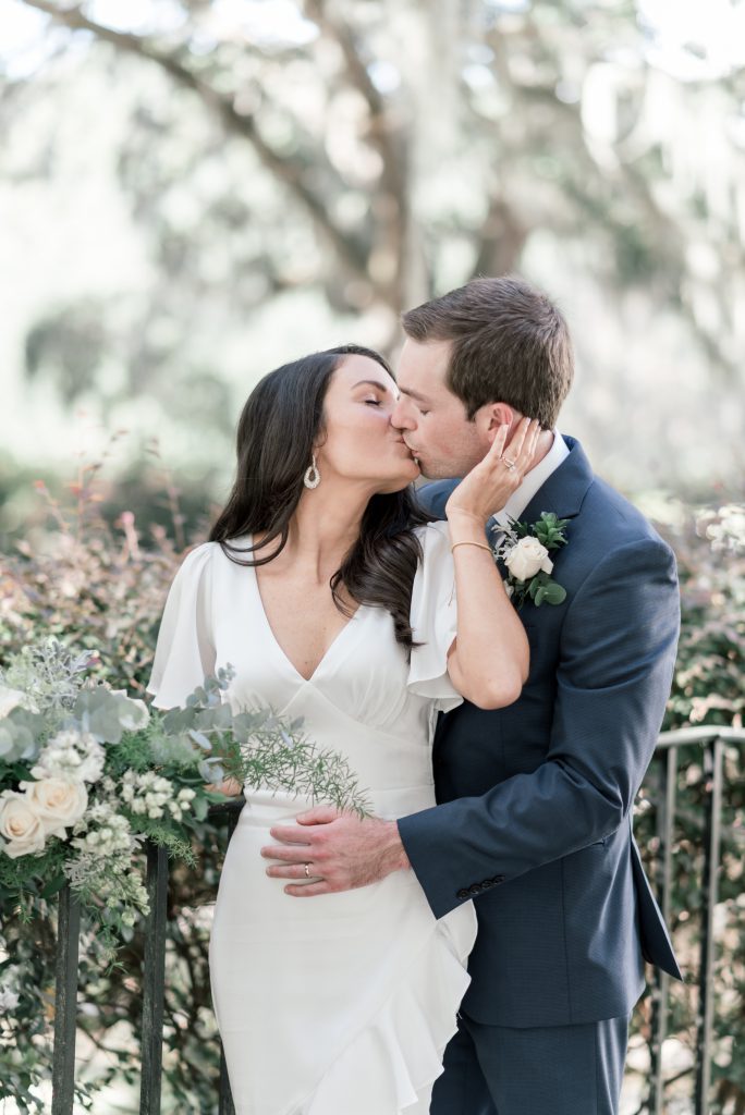 just married couple kiss at intimate wedding