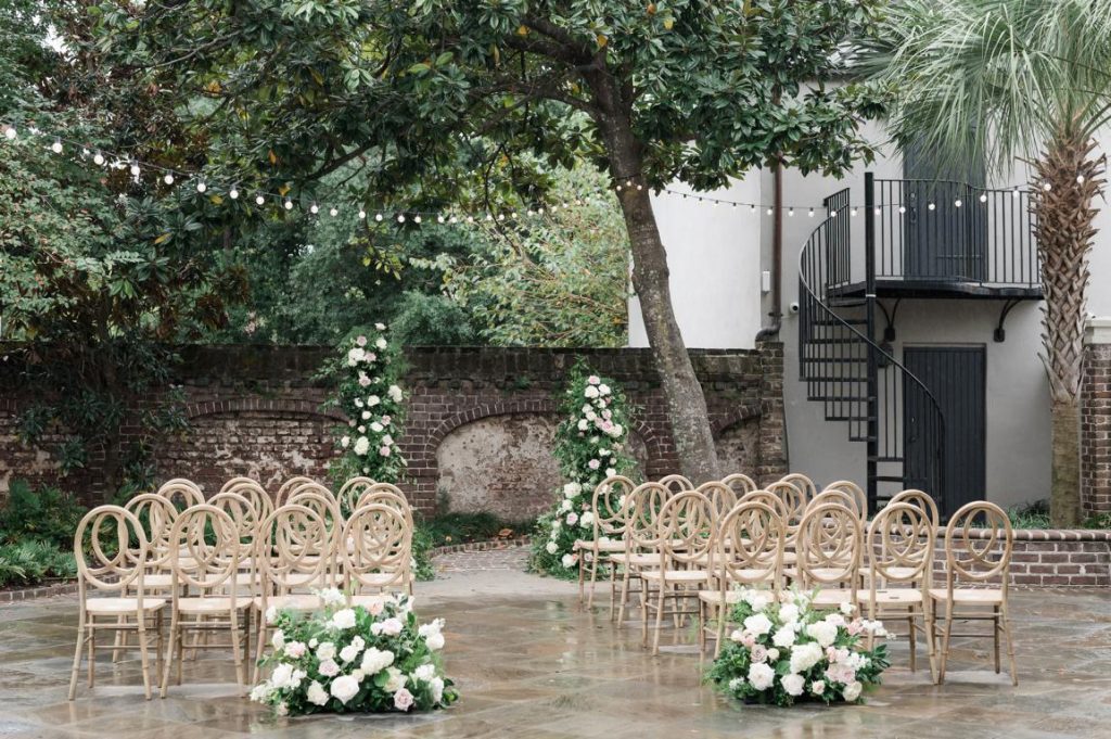 Outdoor wedding ceremony set up at the Gadsden House courtyard