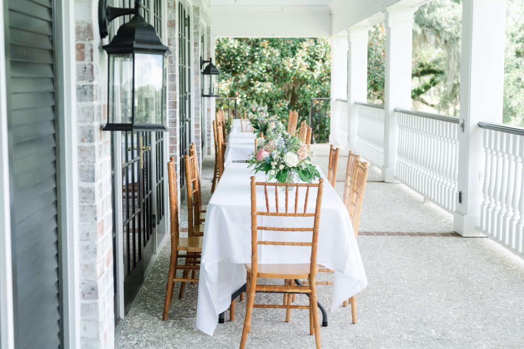 Upstairs porch wedding reception at Dunes West Country Club