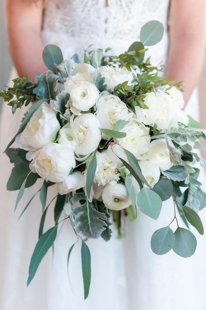 bridal bouquet of white roses and eucalyptus