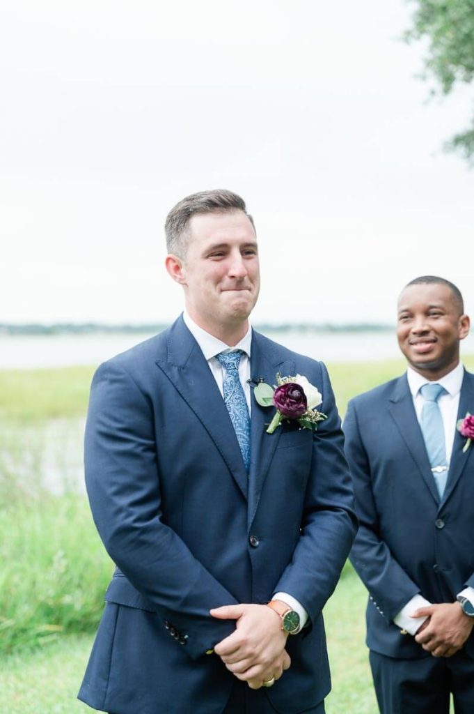 Groom's reaction to seeing his bride walk down the aisle