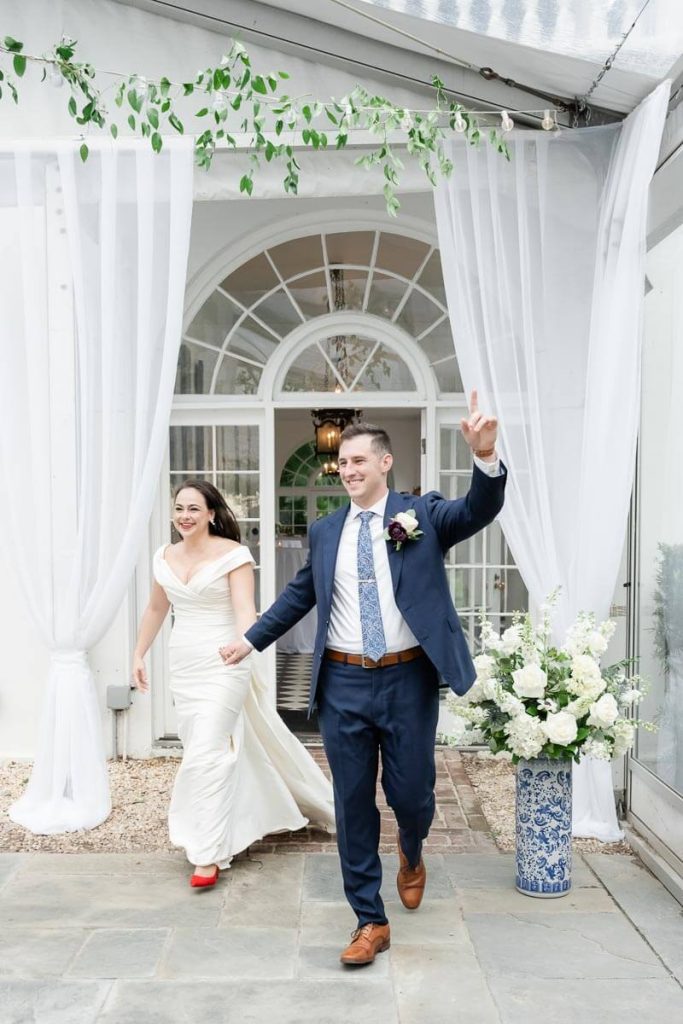 Newlyweds entrance into wedding reception