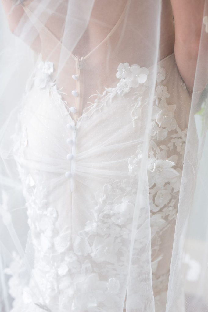 details of wedding dress buttons