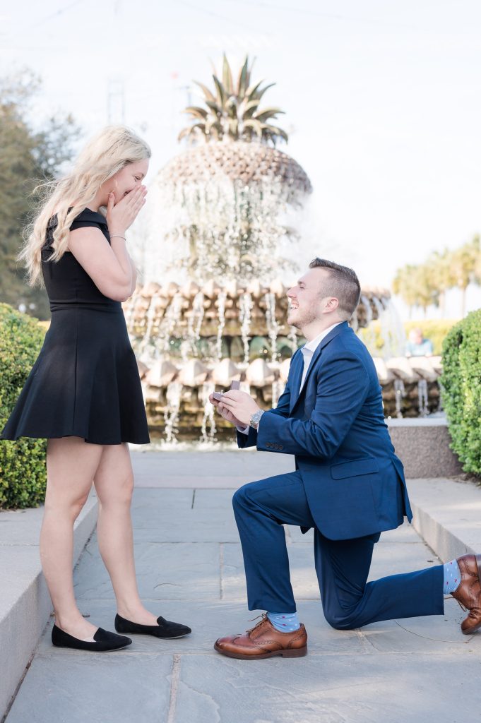 Charleston Pineapple Fountain Proposal man on one knee opening ring box