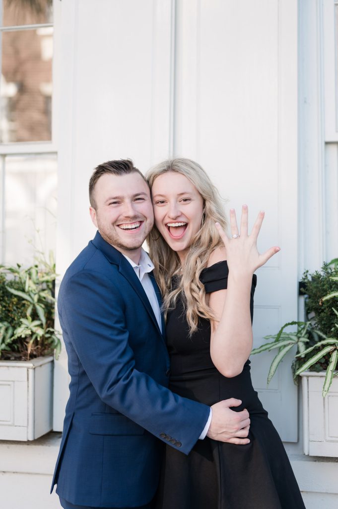 just engaged couple shows off engagement ring