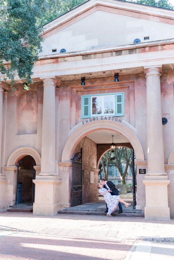 engaged couple dip on College of Charleston campus