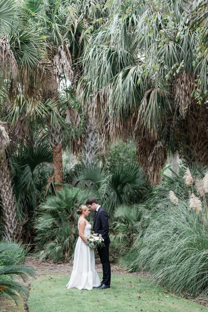 bride and groom leaning forehead to forehead