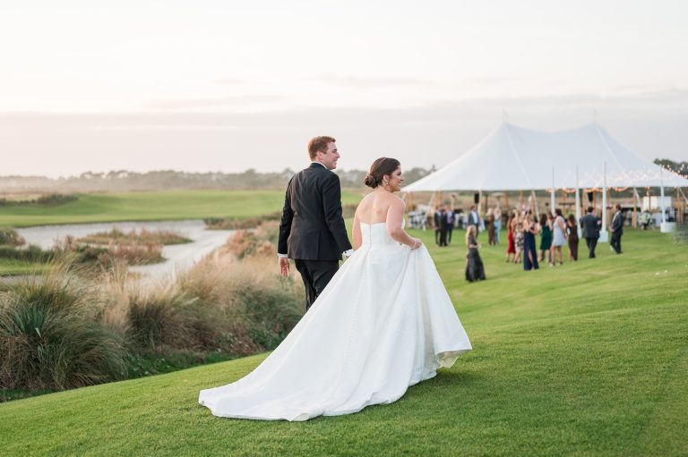 white sail tent on golf course for wedding reception