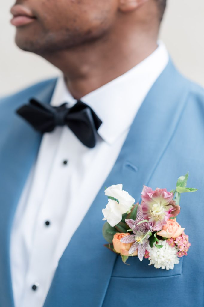 closeup of pocket square floral boutonniere