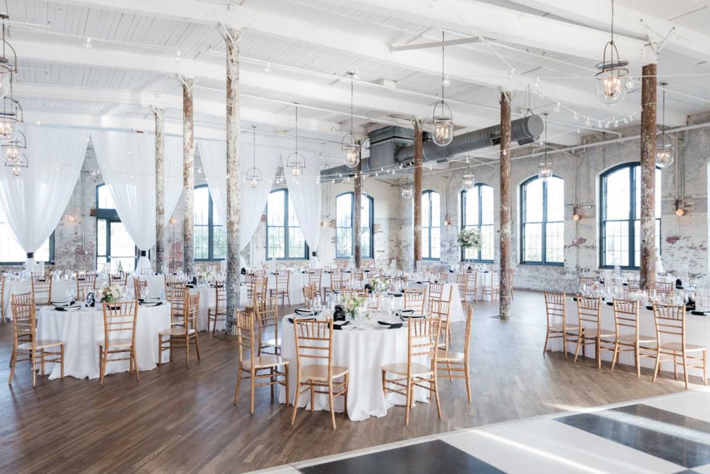 full room photograph of wedding reception set up in the Cedar Room Venue