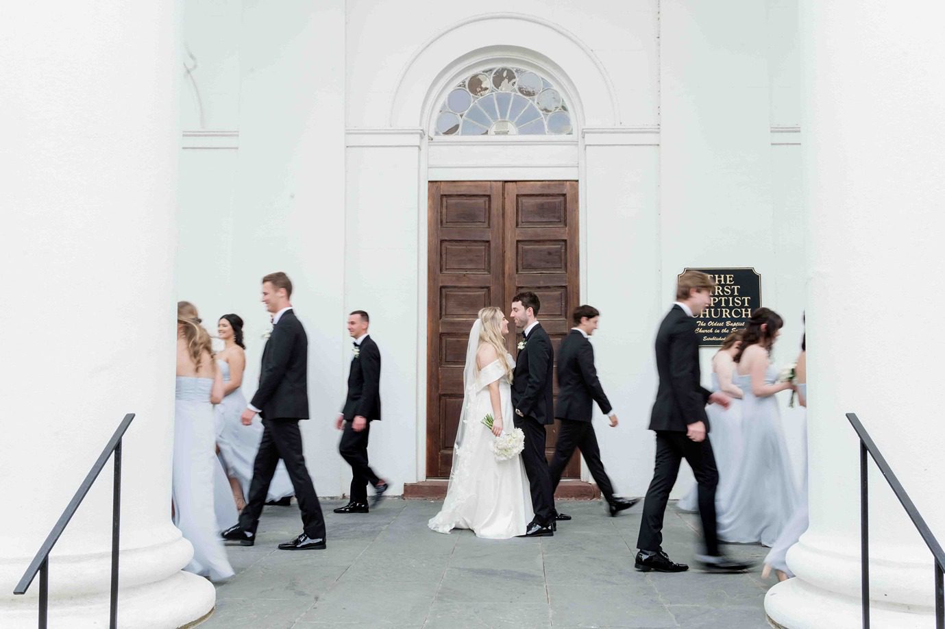 Wedding Party Walking in front of First Baptist Church