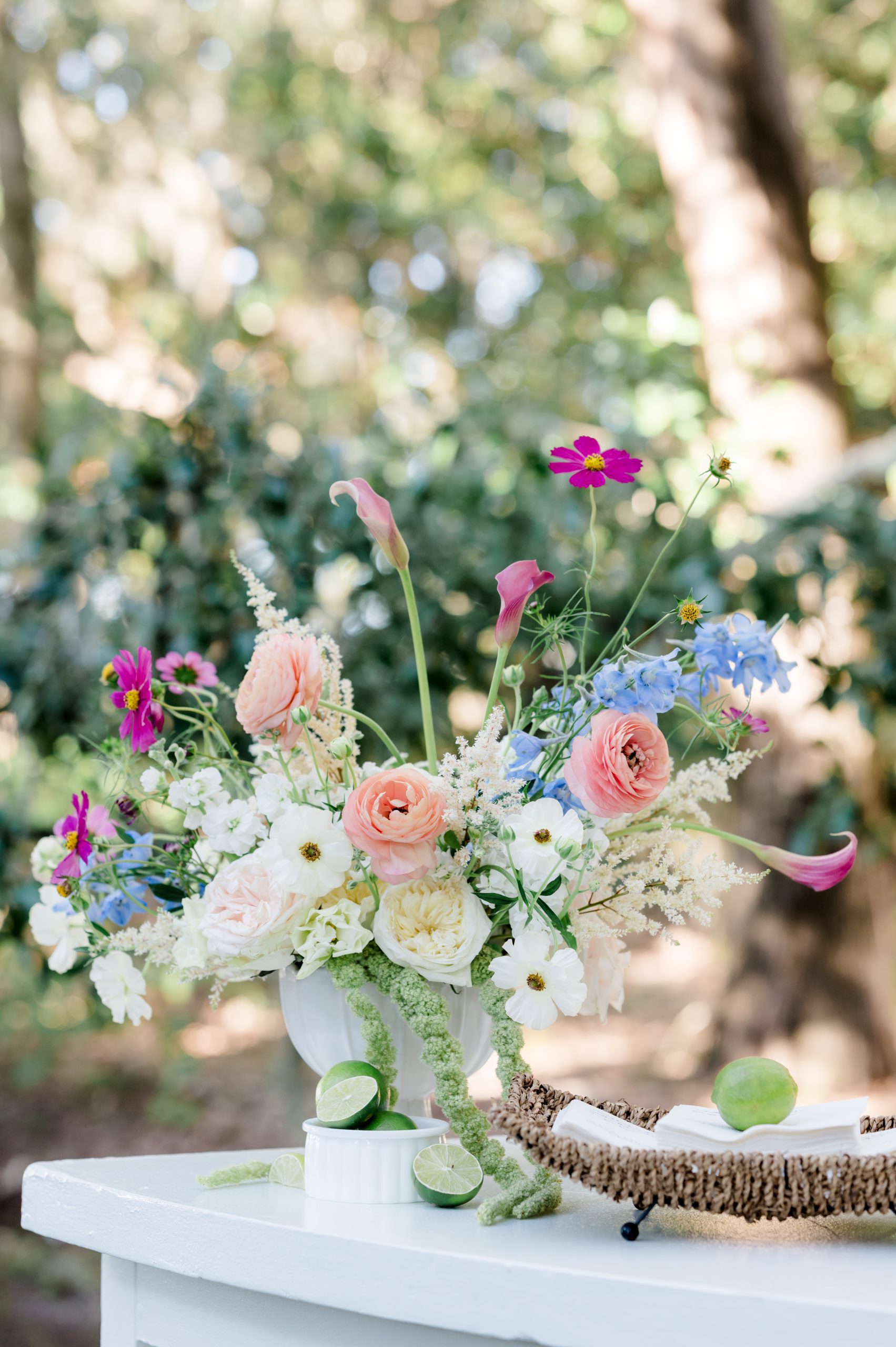 floral display on top of bar with cut limes