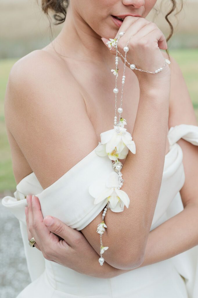 Bridal rosary with pearls and fresh orchids