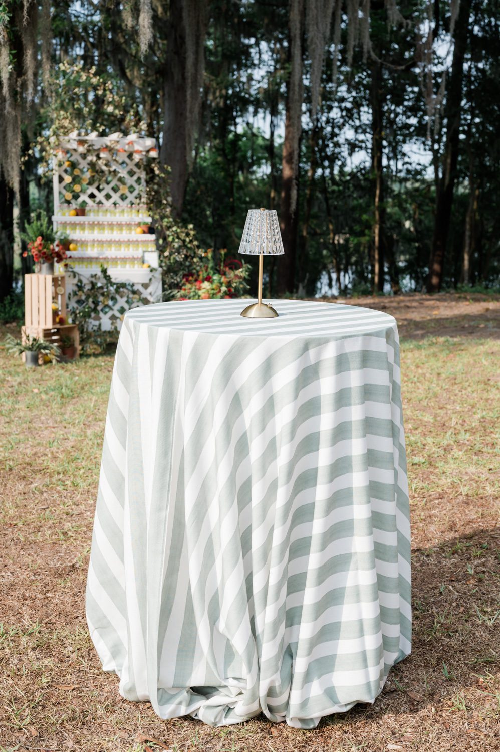 Cocktail table at Middleton Place Inn styled for an Italian-themed rehearsal dinner during a multi-day wedding weekend, featuring elegant dinner details and warm, celebratory ambiance.
