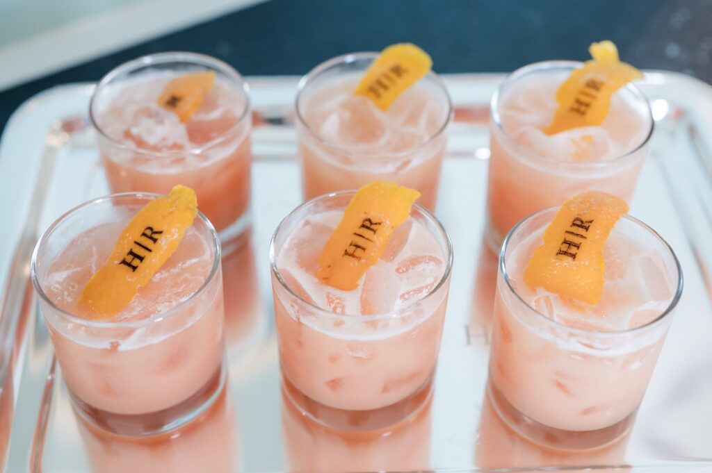Wedding Specialty Cocktails with orange peel branded with couple initals