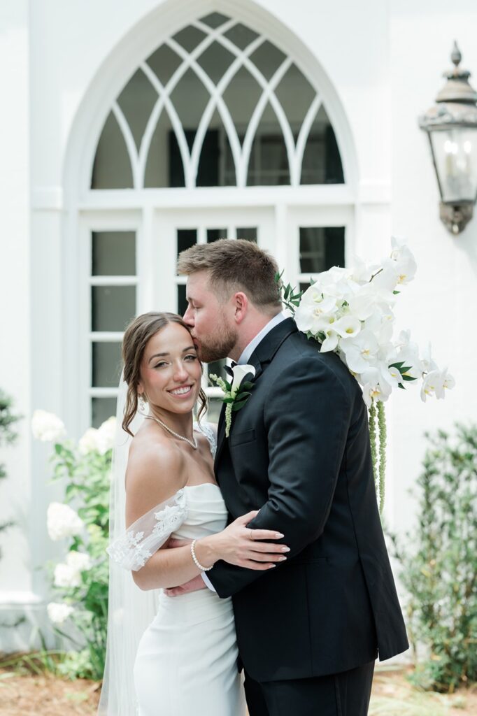 Bride and groom outside of Lowndes Grove wedding venue in Charleston SC