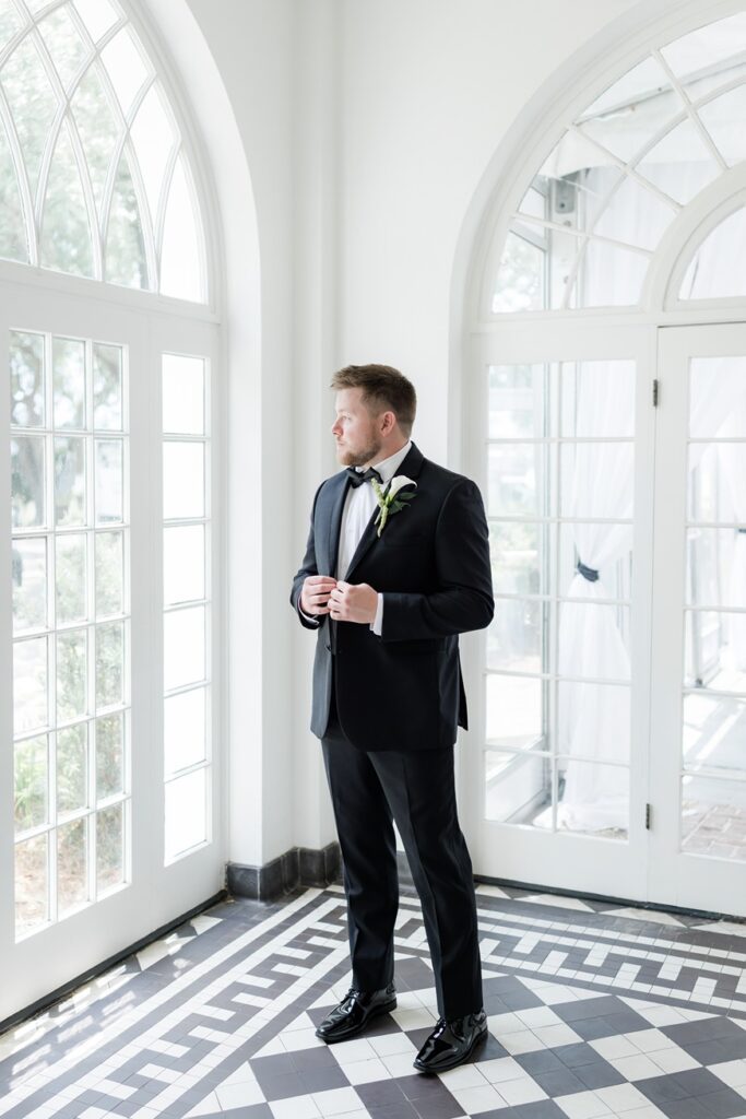 groom portraits in the Lowndes Grove portico